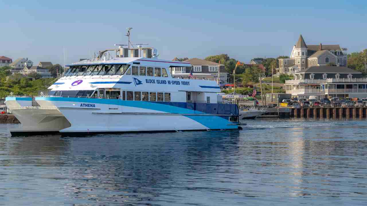 a blue and white boat in the water