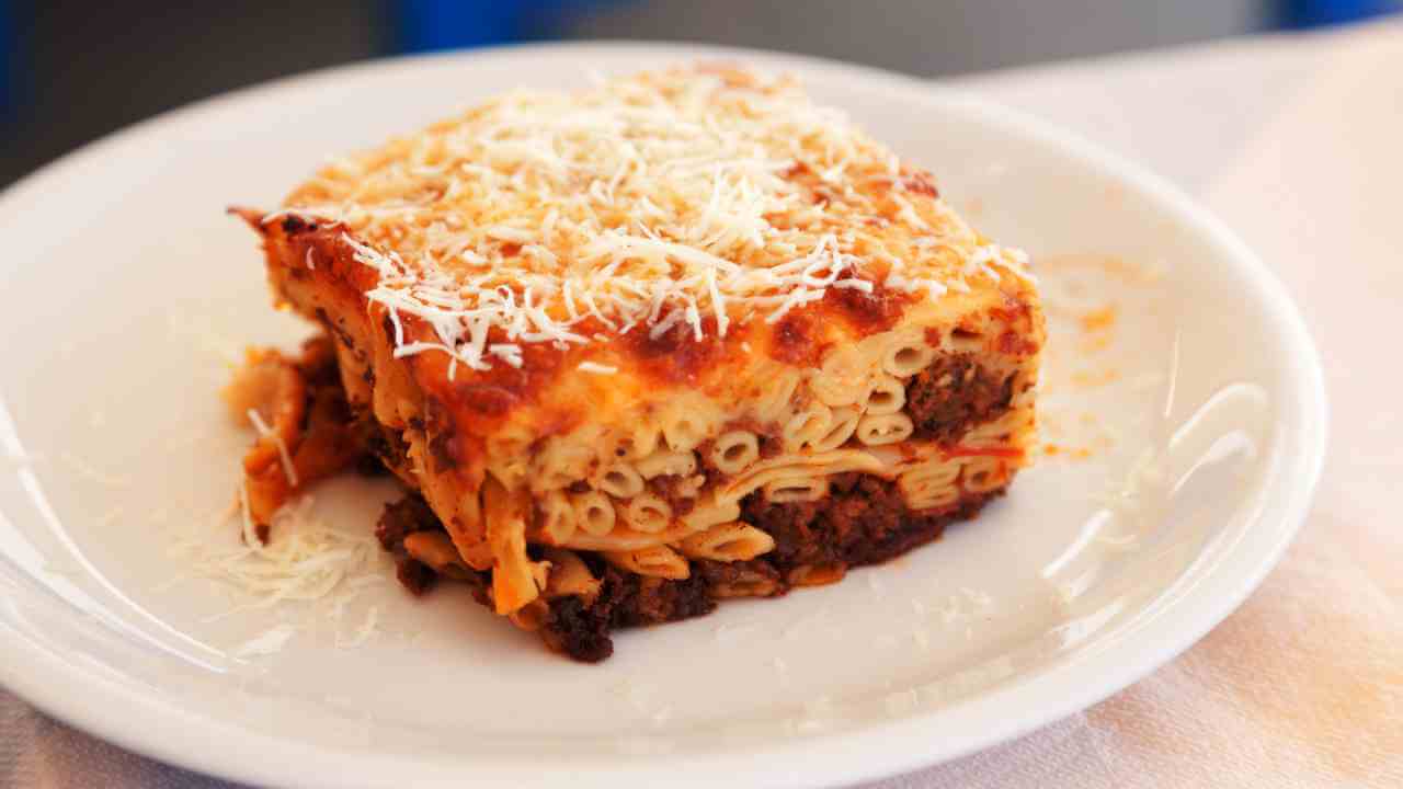 a piece of lasagna on a white plate