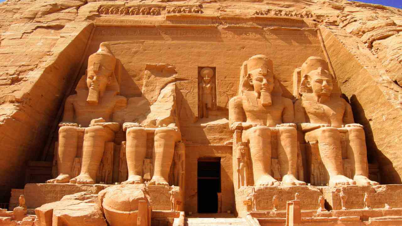 the entrance to abu simbel temple in egypt