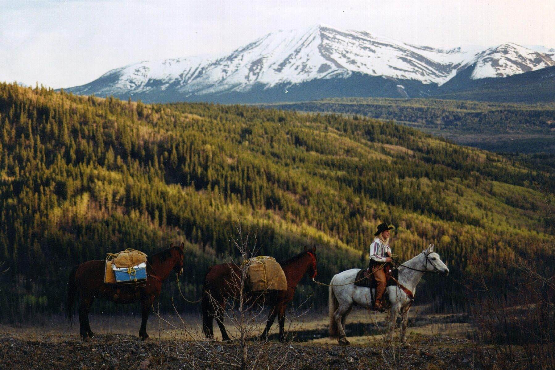 woman riding horseback