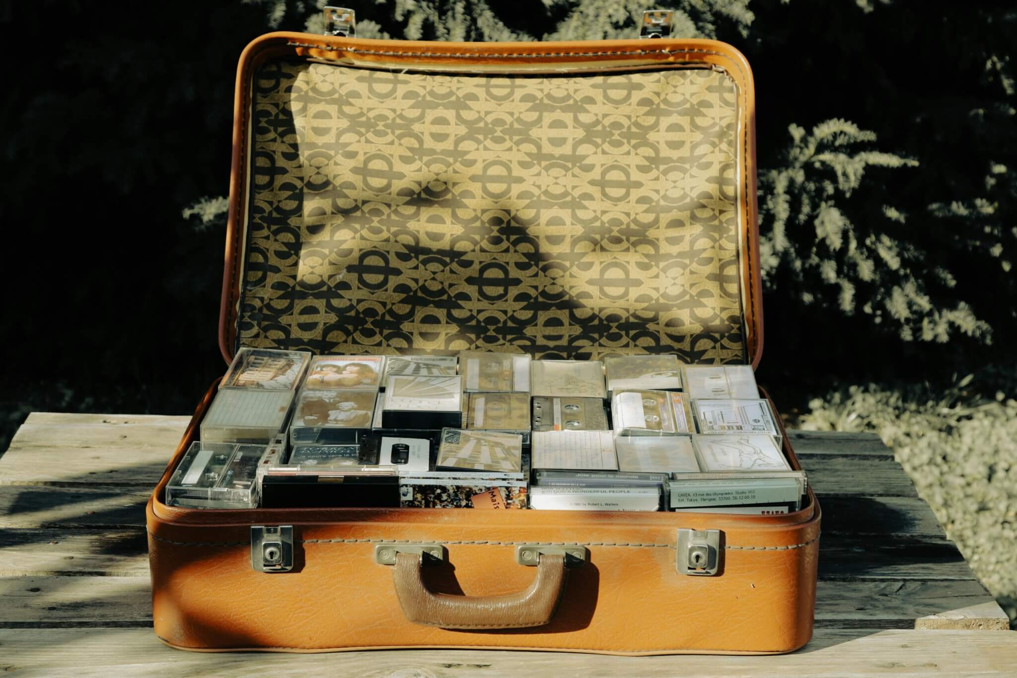 suitcase with cassette tapes