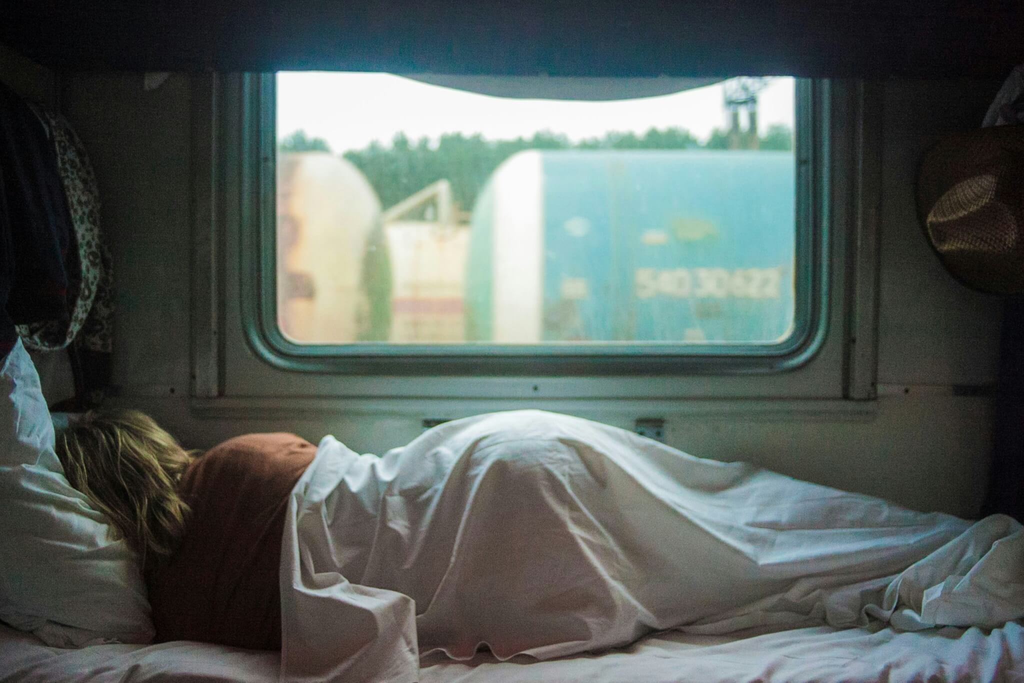 woman asleep on a train