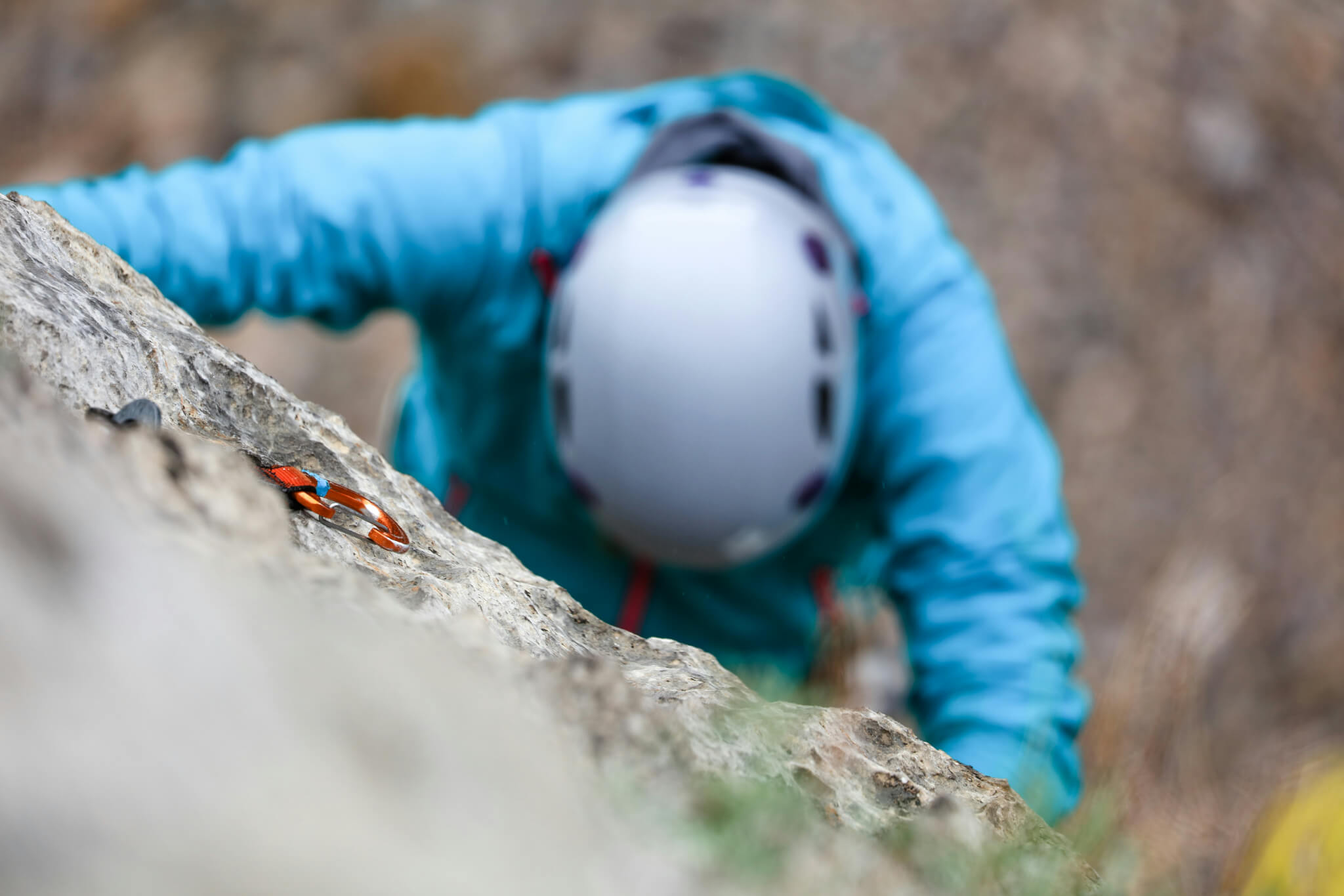 person rock climbing