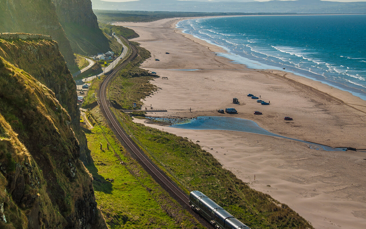 Train track between Londonderry and Coleraine near the Atlantic Ocean, one of the most beautiful rail journeys in the world.