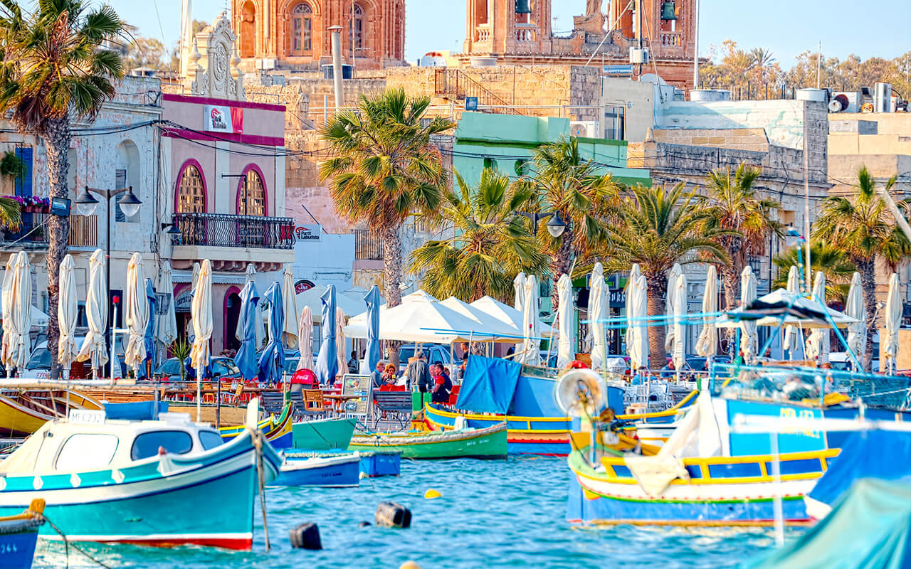 Luzzu anchored in Malta, at the port of Marsaxlokk