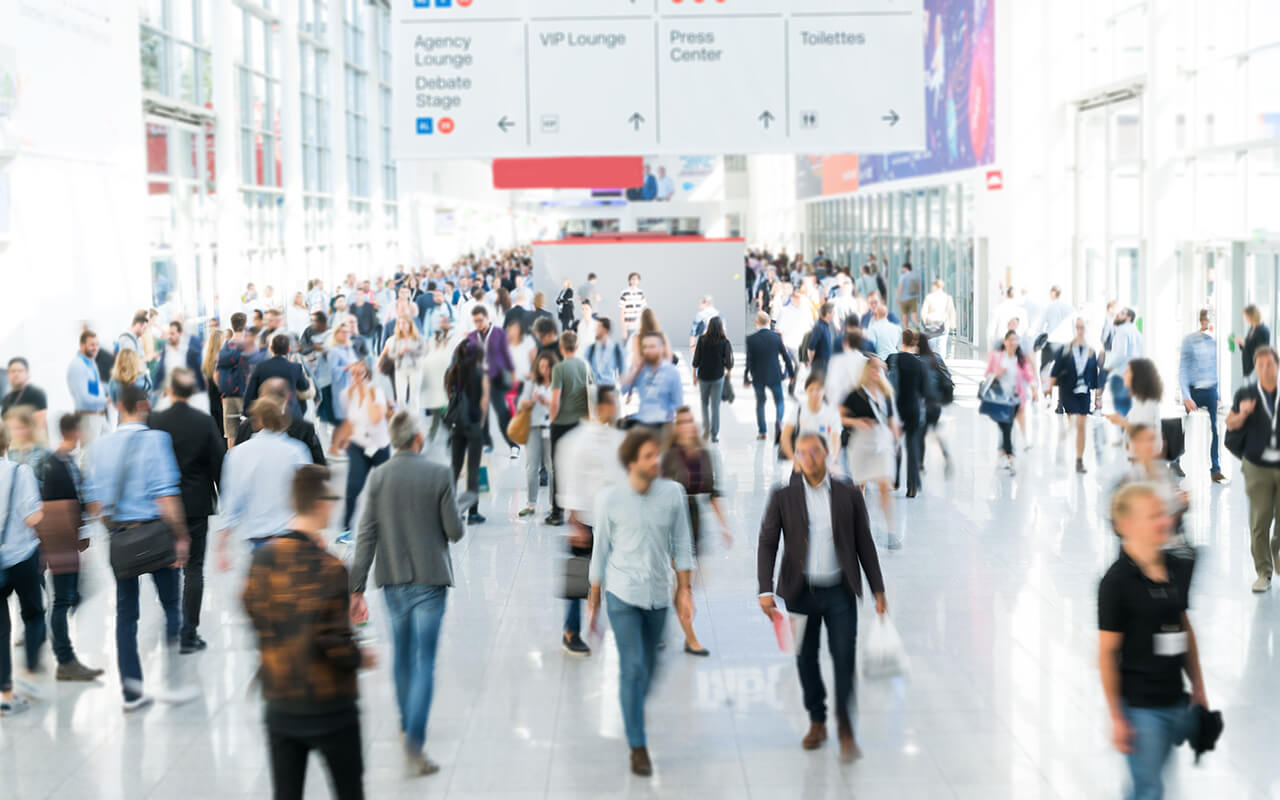 people walking through airport, blurred photo