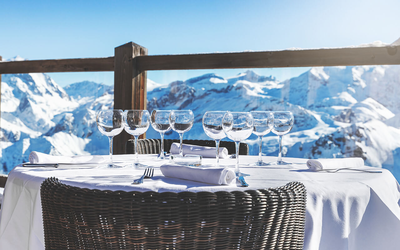 luxury restaurant table with beautiful landscape view in alpine mountains
