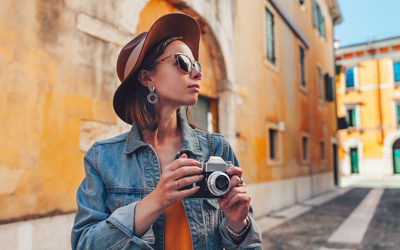 Tourist holding a camera