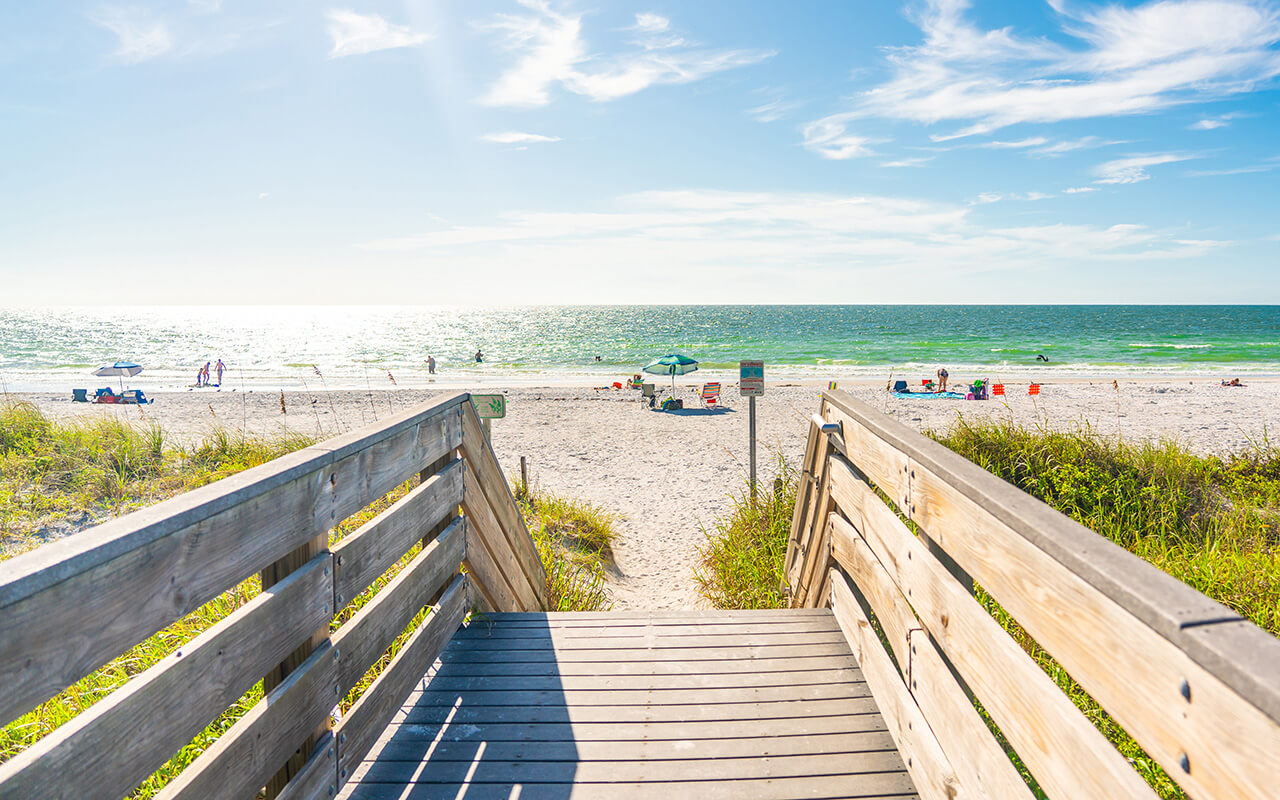 Wooden Boardwalk to Indian rocks beach in Florida, USA