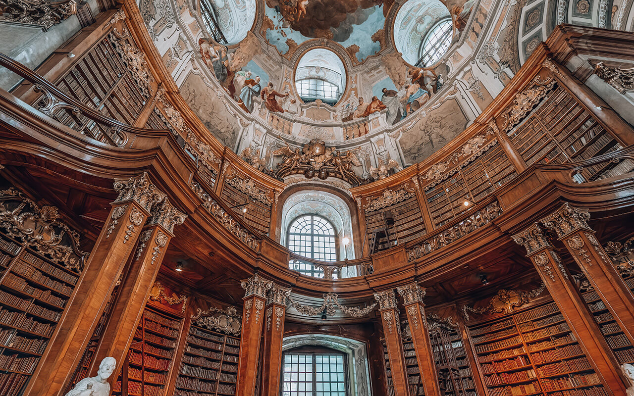 Books on the bookshelf at Prunksaal inside imperial national library in Vienna, Austria