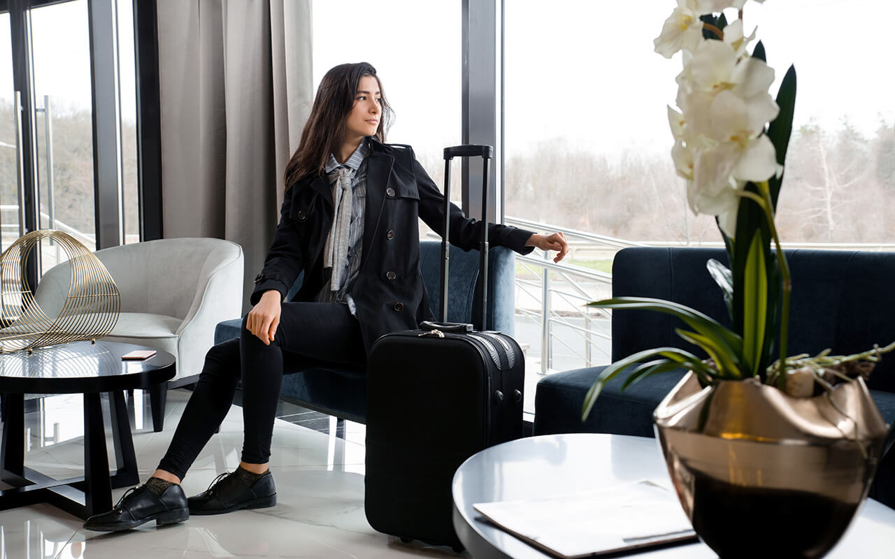 Woman sitting at an airport lounge