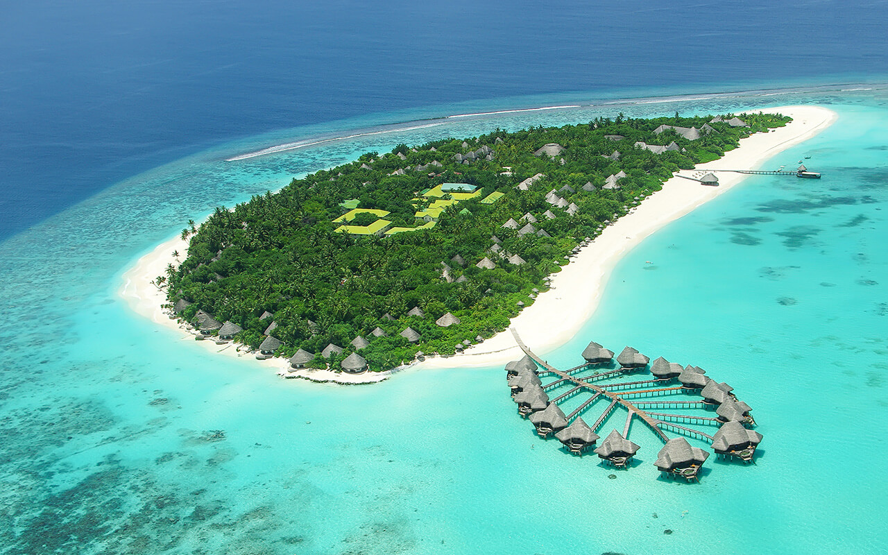 Maldives resort with beach and clear water