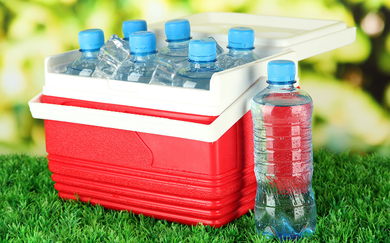 Cooler packed with water bottles