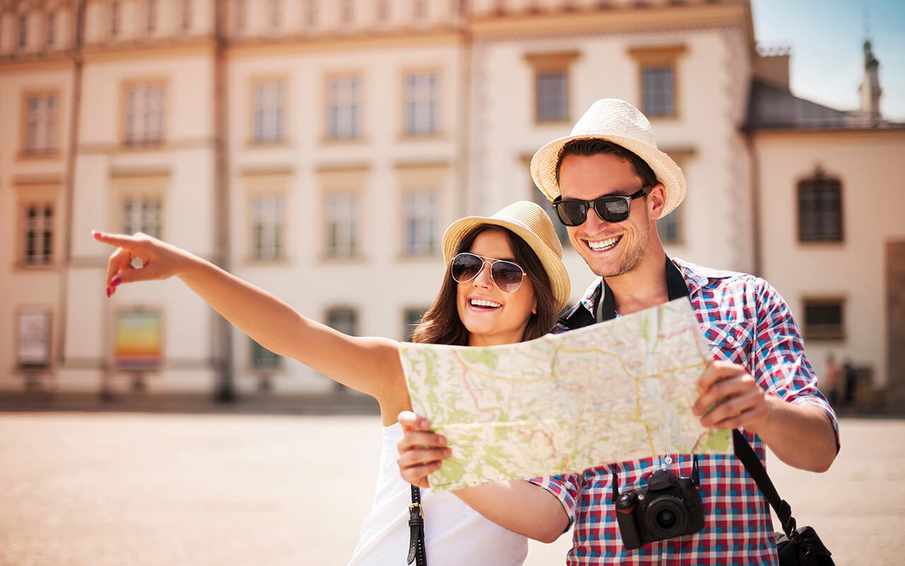 Couple pointing out spots while sightseeing