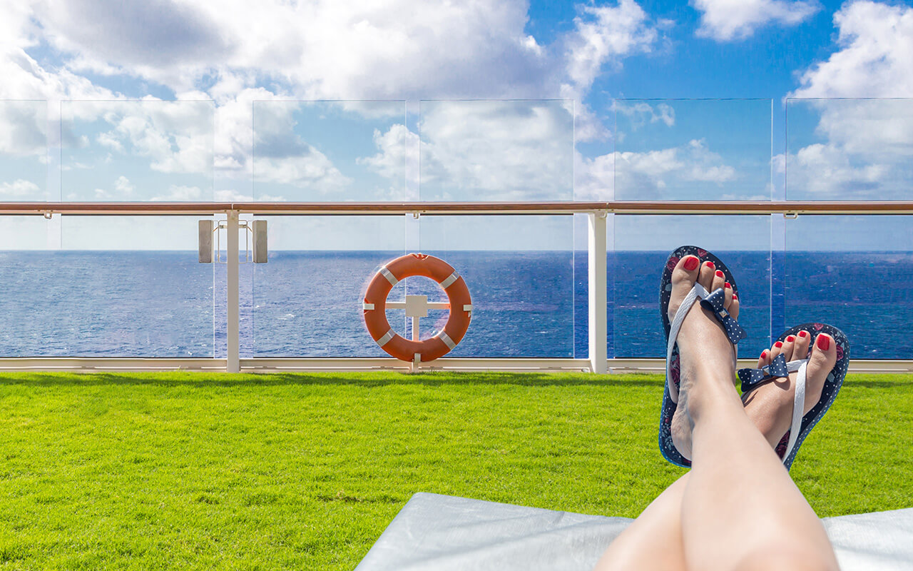 Woman lounging on cruise deck