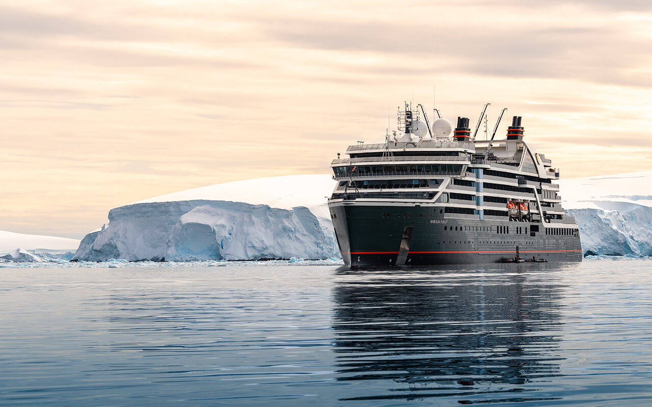 Fish Islands, Antarctica - January 13, 2024: Seabourn Pursuit expedition cruise ship in Antarctica.