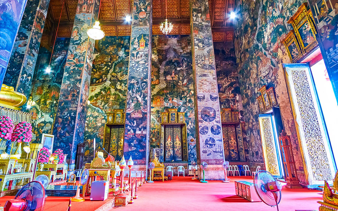 Scenic frescoes on the wealls of Ordination Hall of Wat Suthat Temple in Bangkok