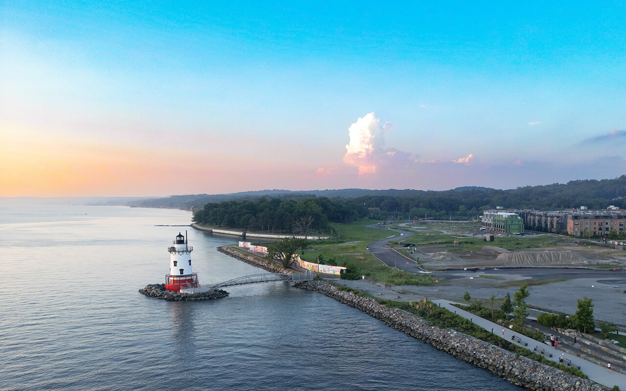 Aerial sunset view of Hudson River in New York State near Tarrytown with Sleepy Hollow Lighthouse in view