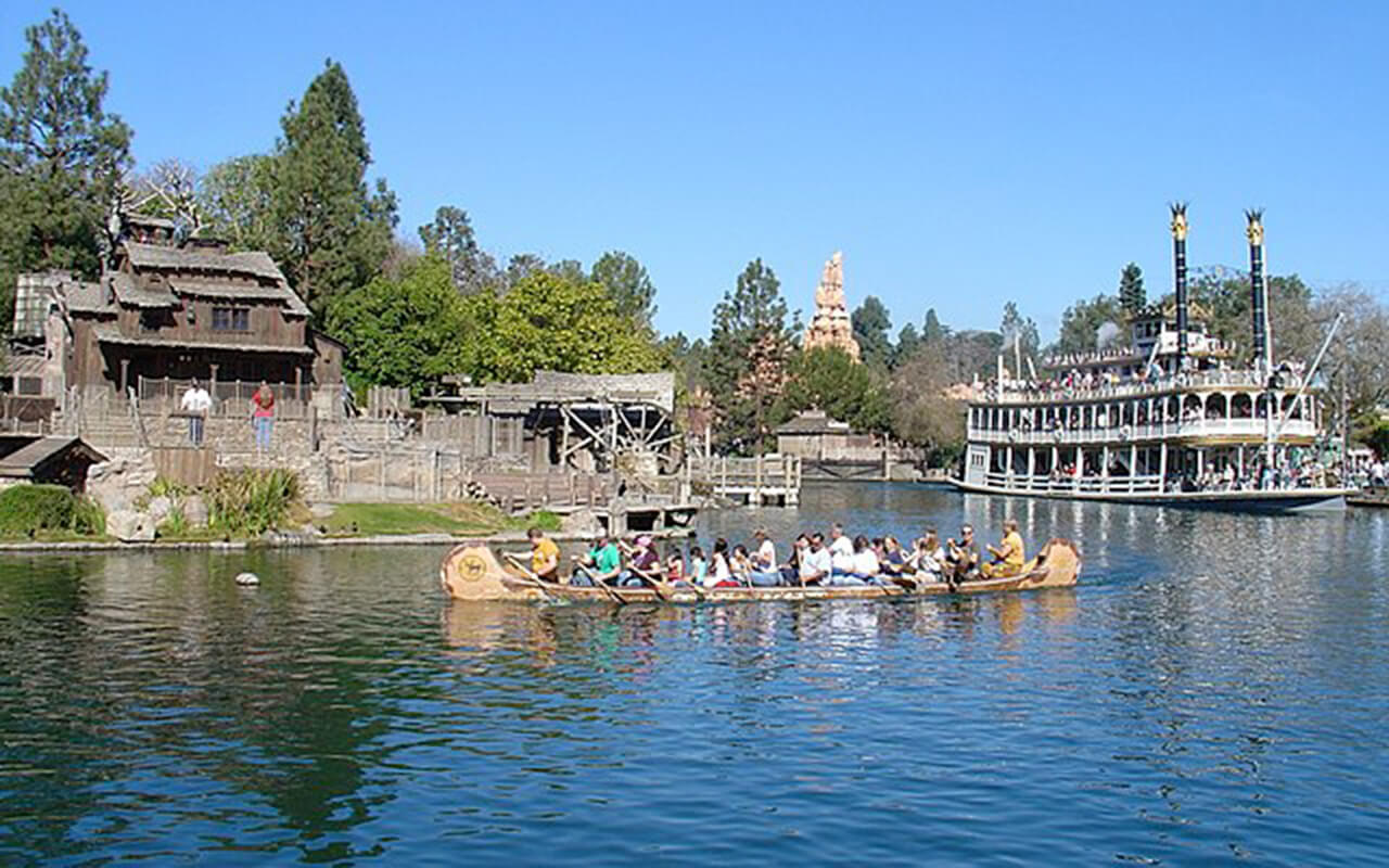 Showing Tom Sawyer Island, Mark Twain Riverboat, Davy Crockett's Explorer Canoes and Big Thunder Mountain