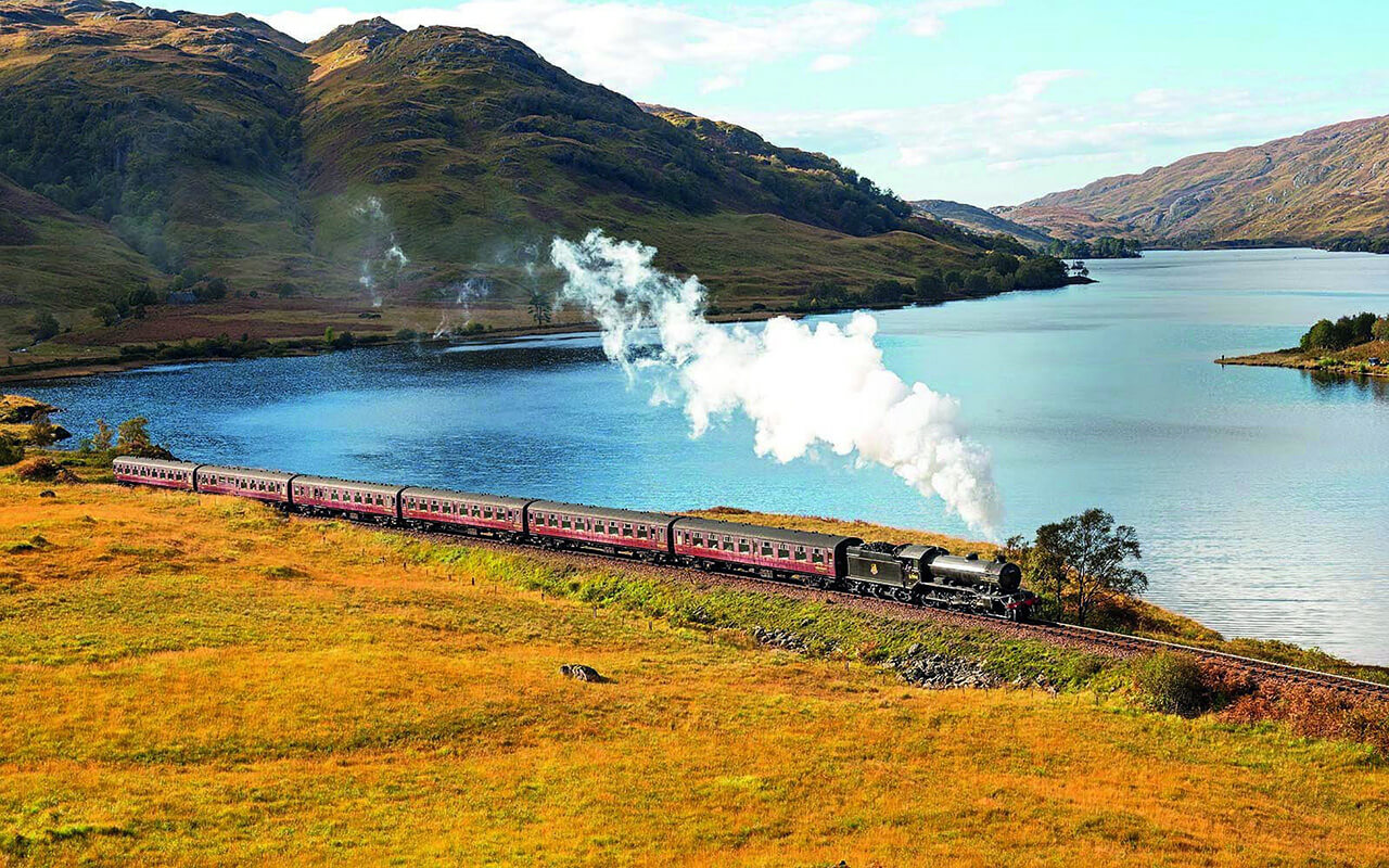 Jacobite Steam Train rolling through Scotland