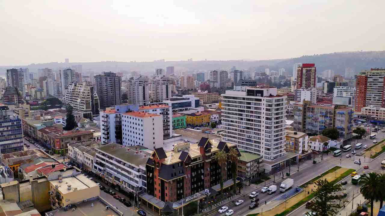 an aerial view of a city with lots of tall buildings