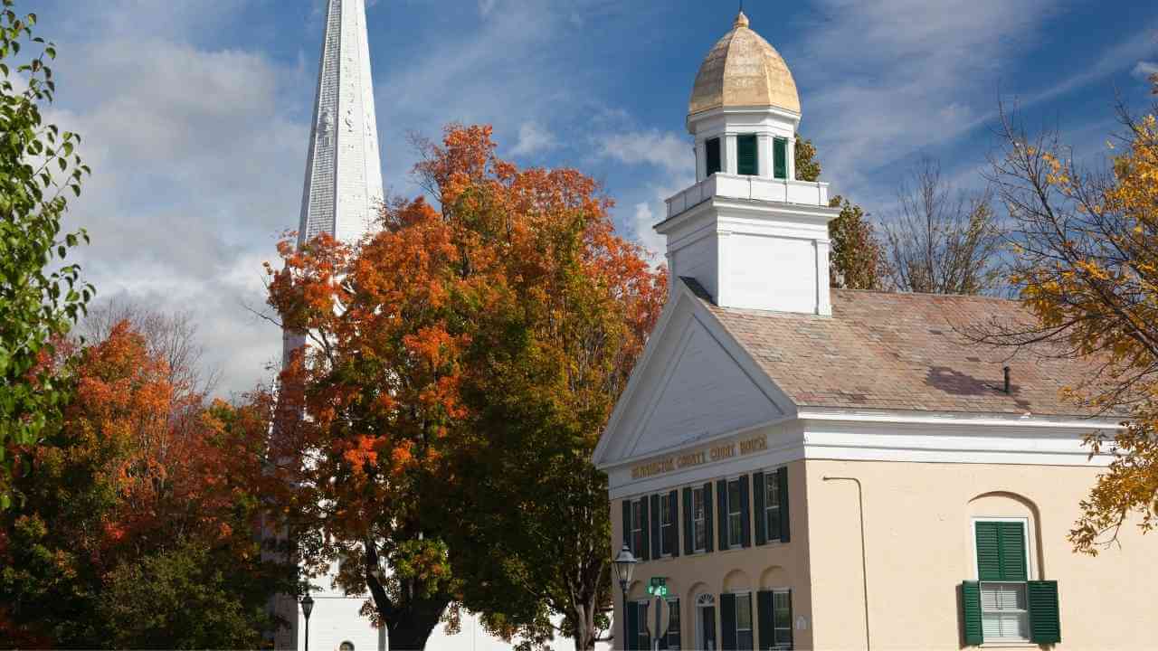 a church with a steeple in the stage