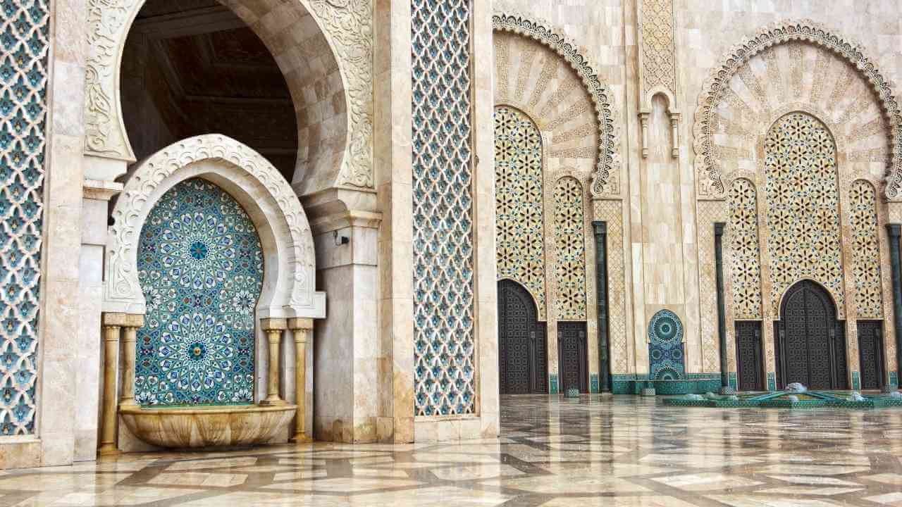 the inside of an ornate building with a fountain