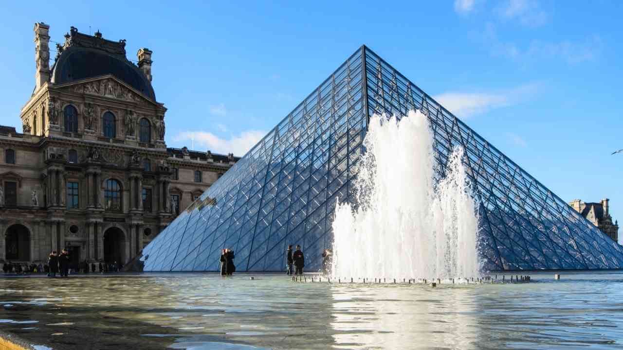 the louvre in paris, france - louvre paris stock videos & royalty-free footage