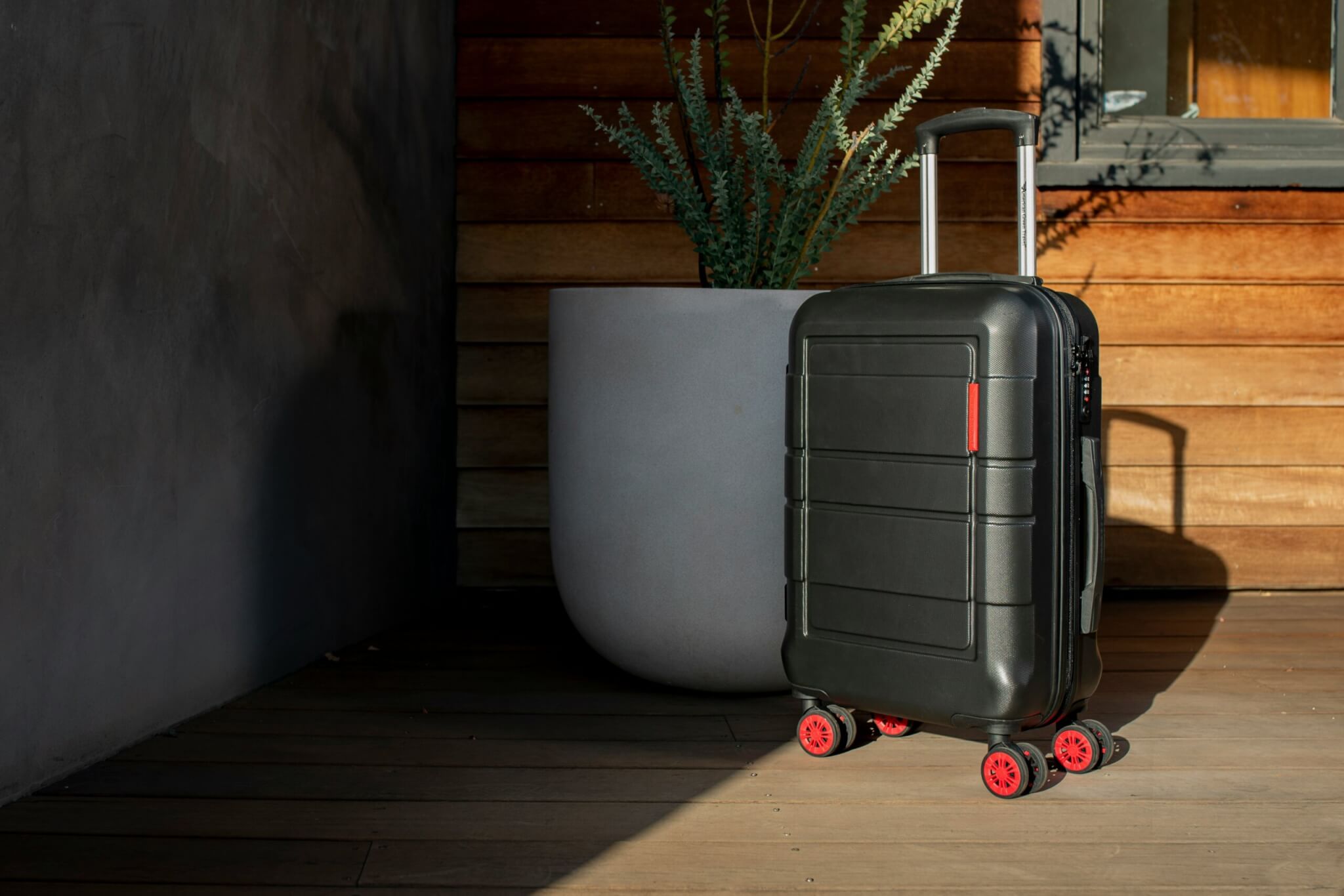 black rolling suitcase