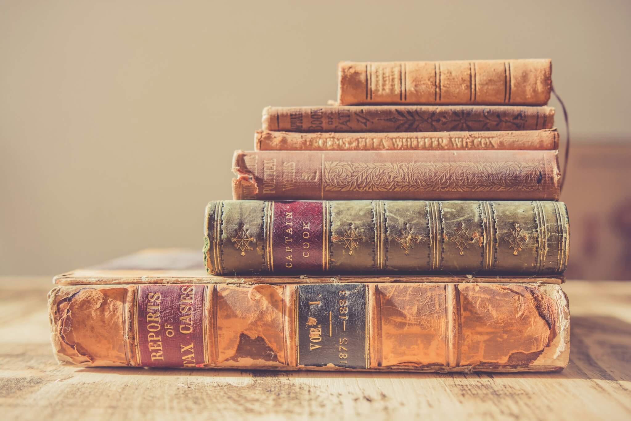 stack of antique books