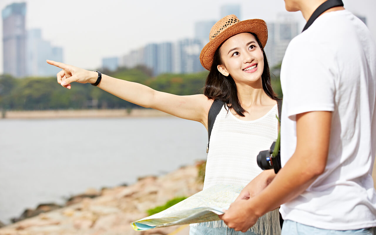 Tourist pointing to a landmark