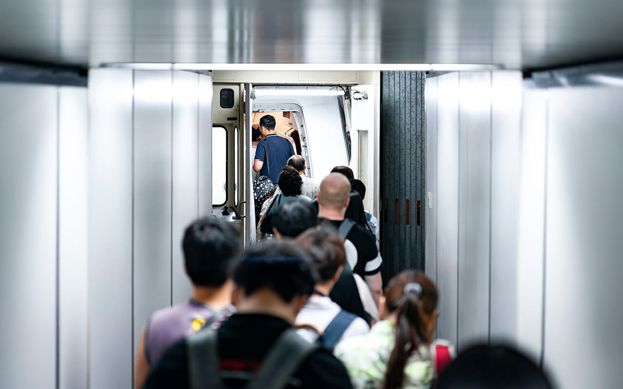 Passengers boarding an airplane