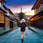 Woman walking down street in Japan