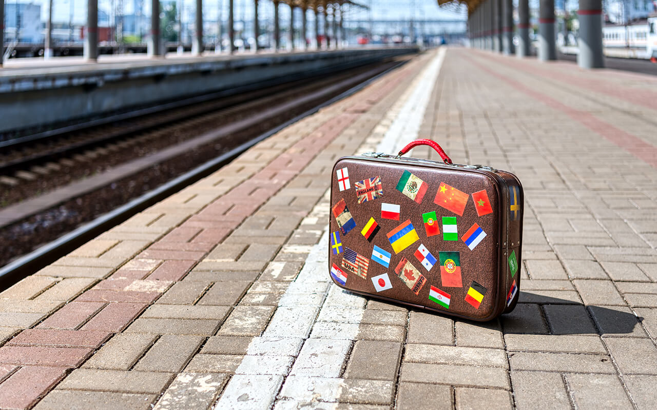 Suitcase adorned with stickers