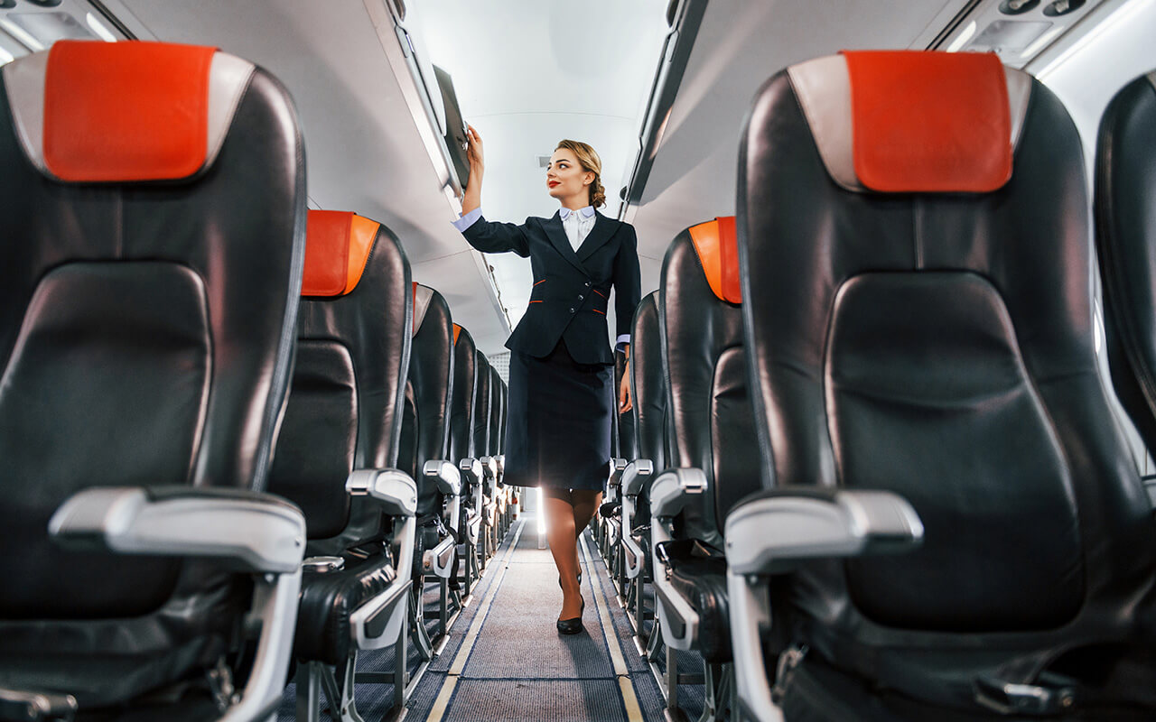 Flight attendant on a plane