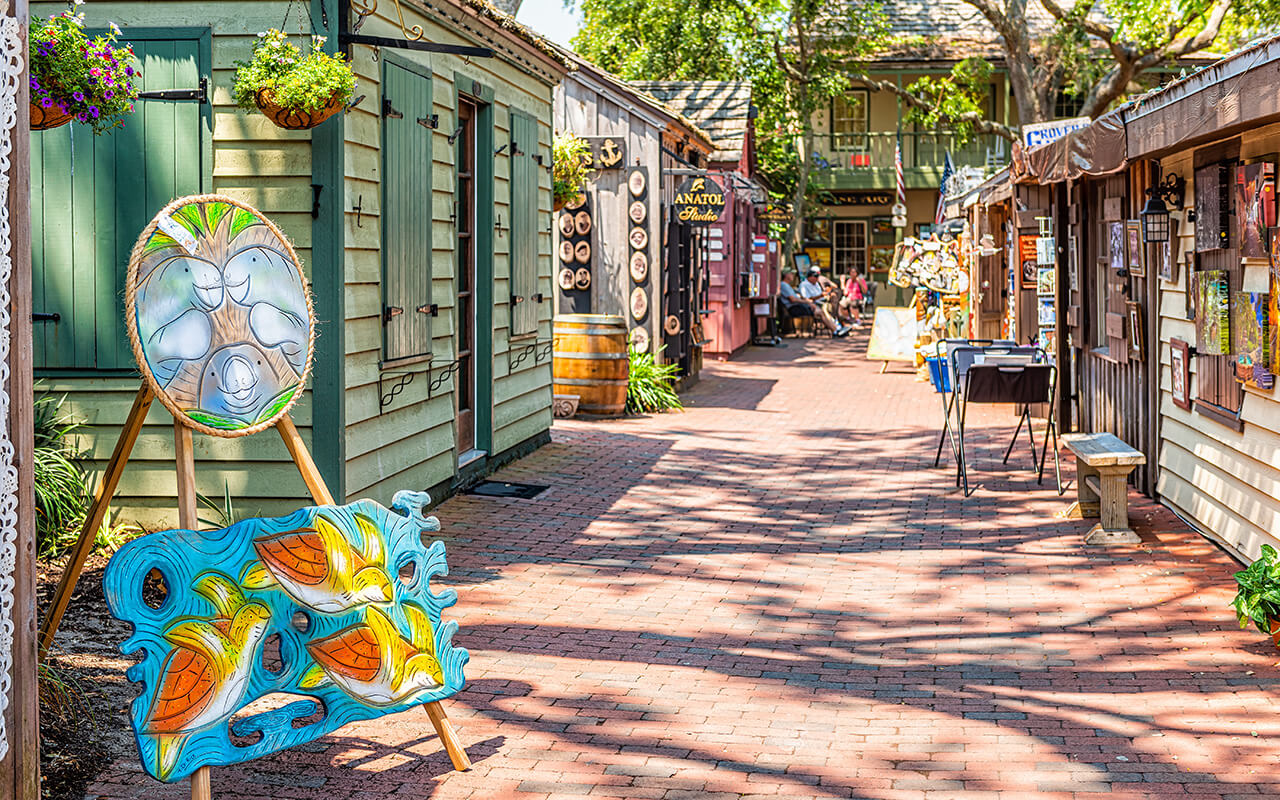 St. Augustine, USA - May 10, 2018: Saint George Street with artwork on sunny day