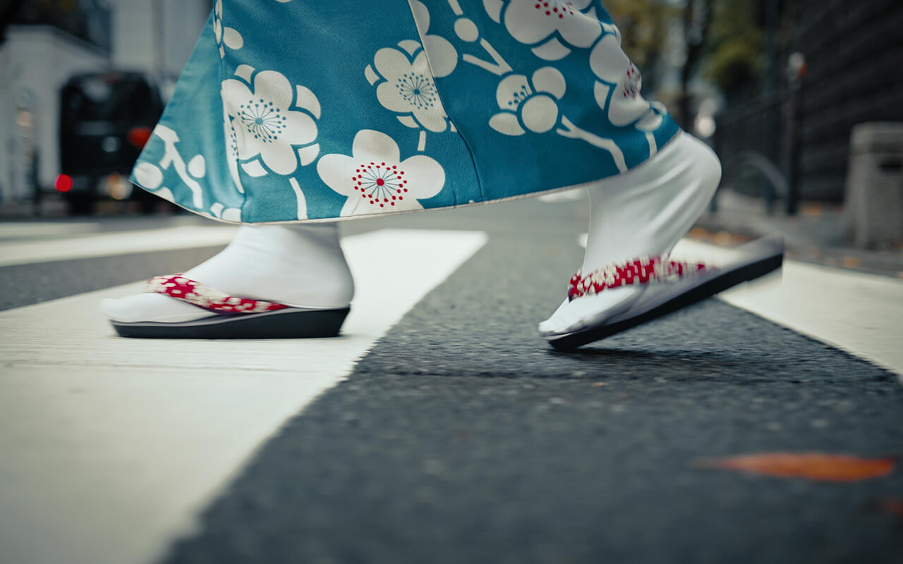 Japanese woman crossing the street