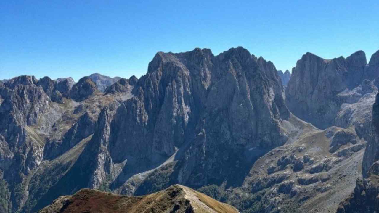 the view from the top of a mountain in the dolomites