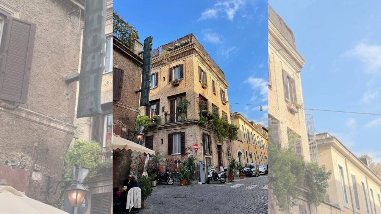 an old building in the middle of a cobblestone street