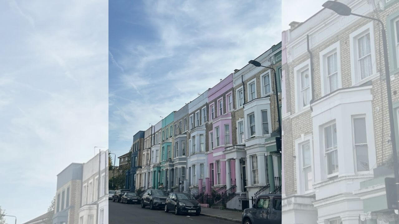 a row of colorful houses on a street in london