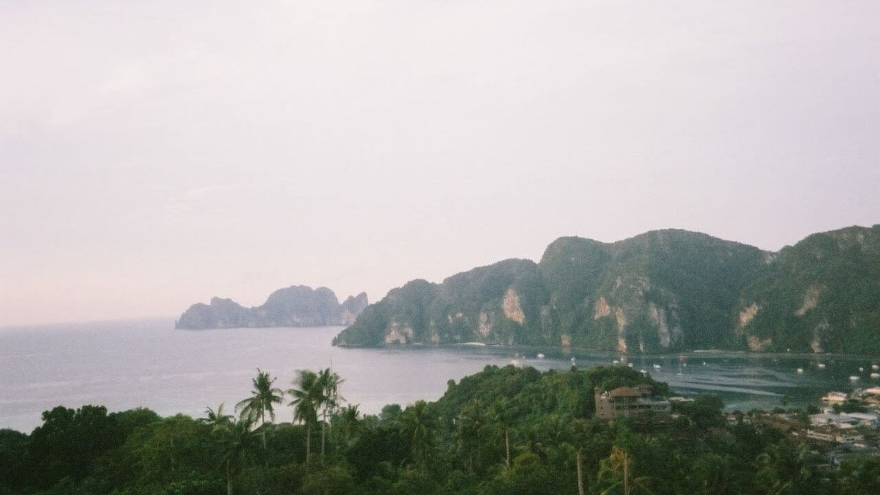 the view from the top of a hill overlooking the ocean