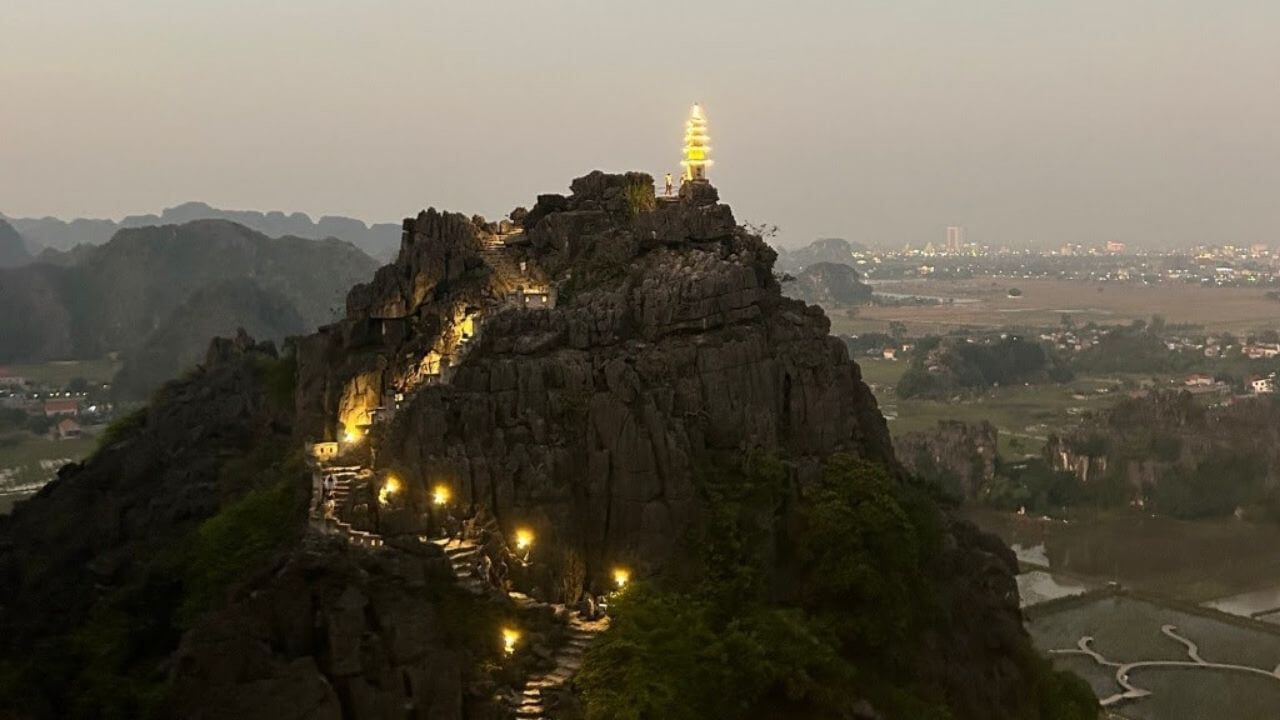 an aerial view of a pagoda on top of a mountain