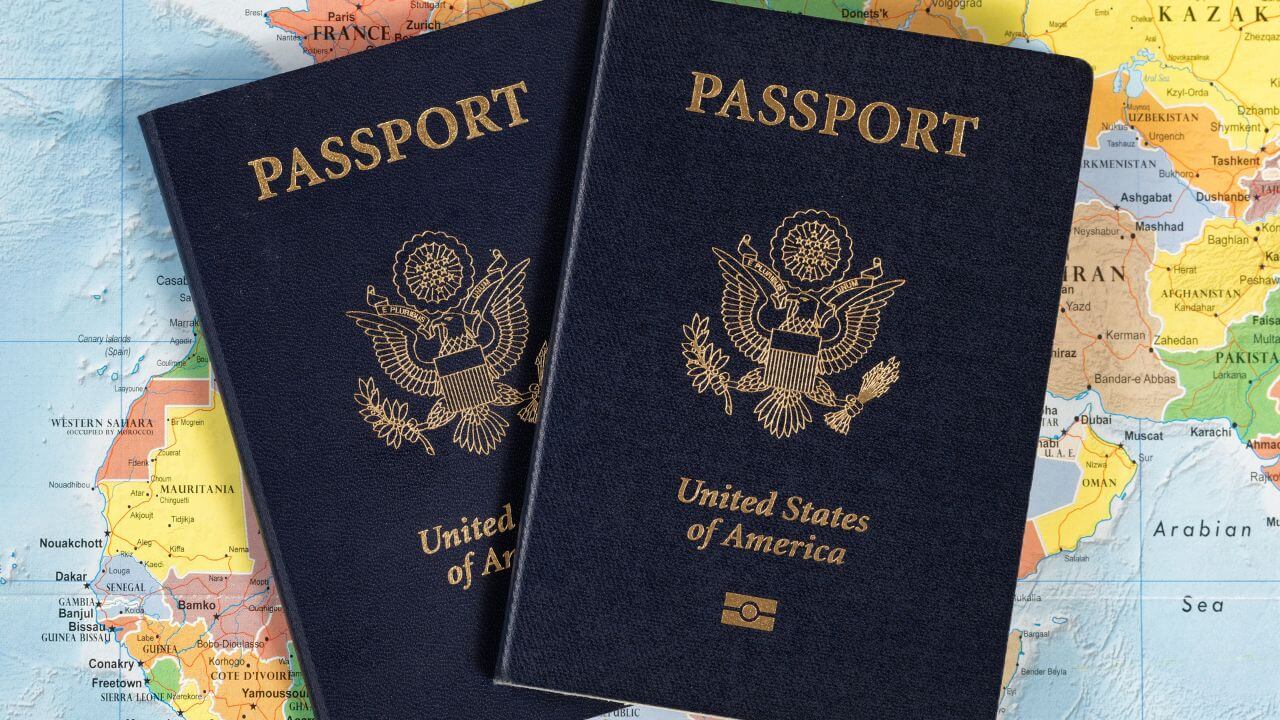 two passports on a world map