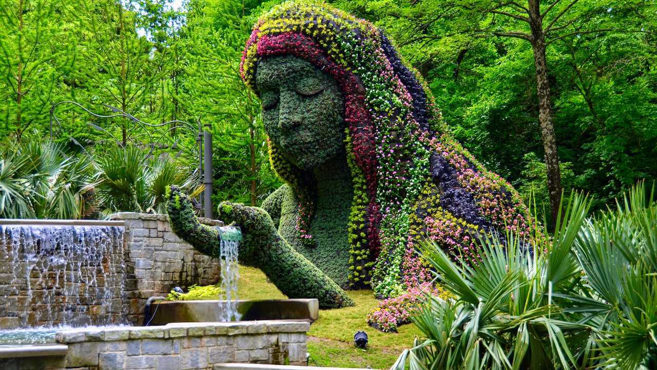 a statue made out of flowers