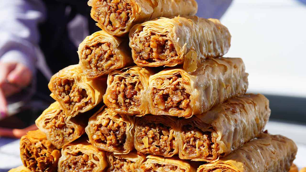 a stack of baklava sitting on top of a table