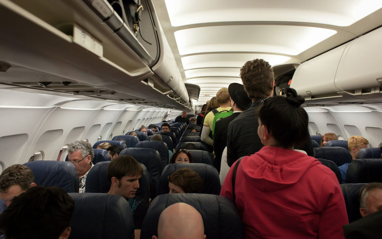 Passengers boarding an airplane