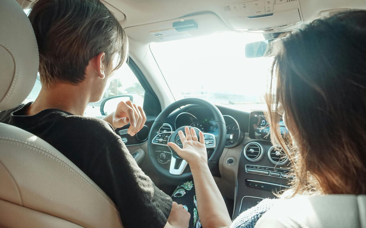 Passenger talking to driver