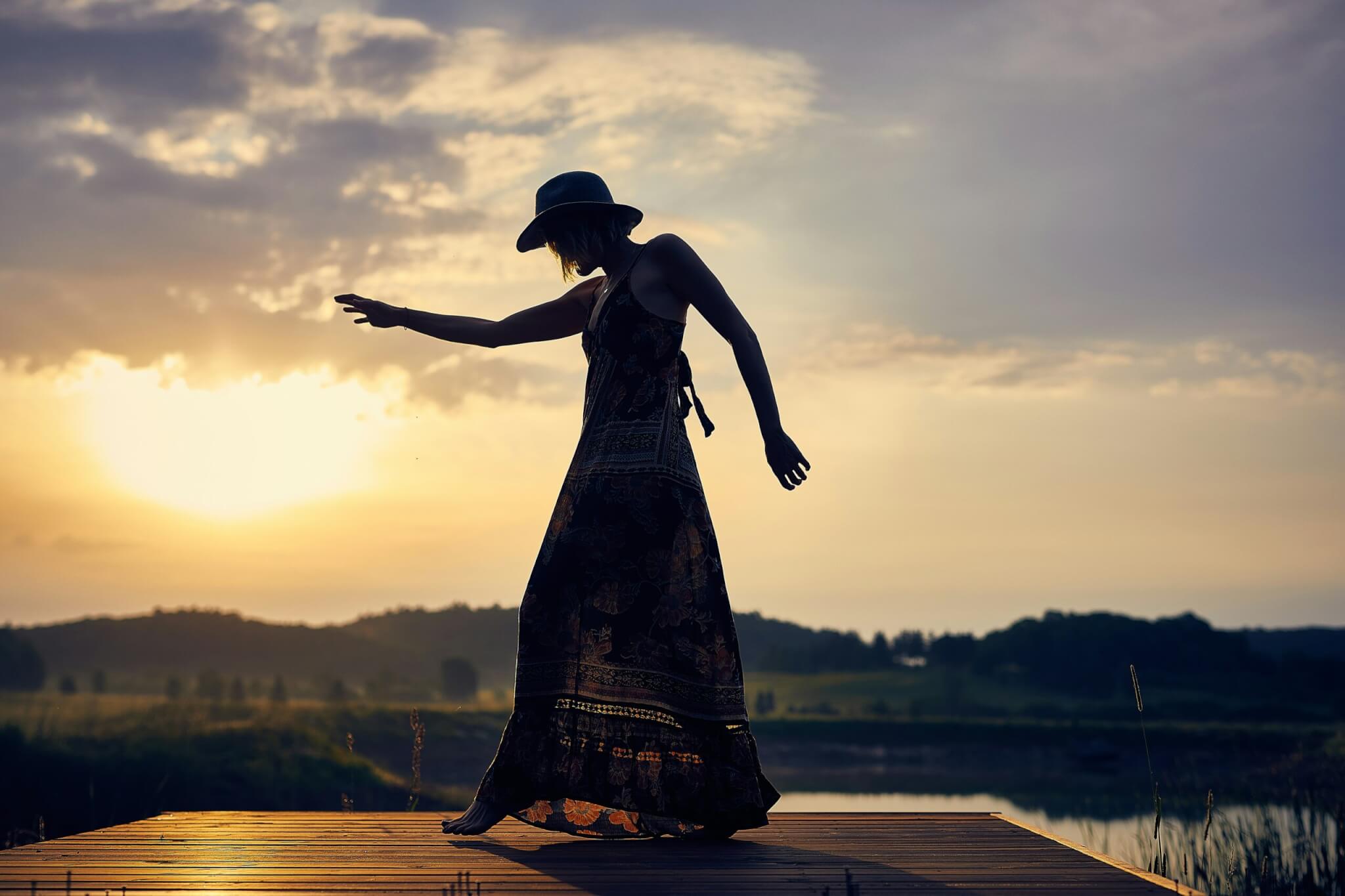 woman dancing in the sunlight