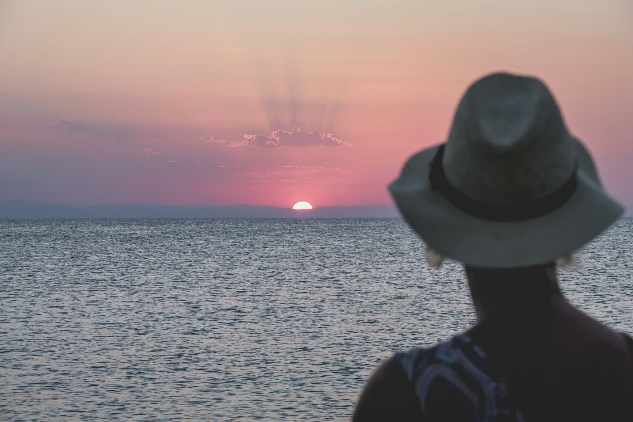 woman watching sunset