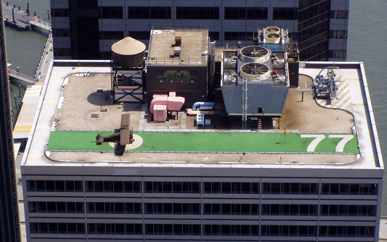 Plane on the Roof Top of 77 Water Street building in Manhattan.